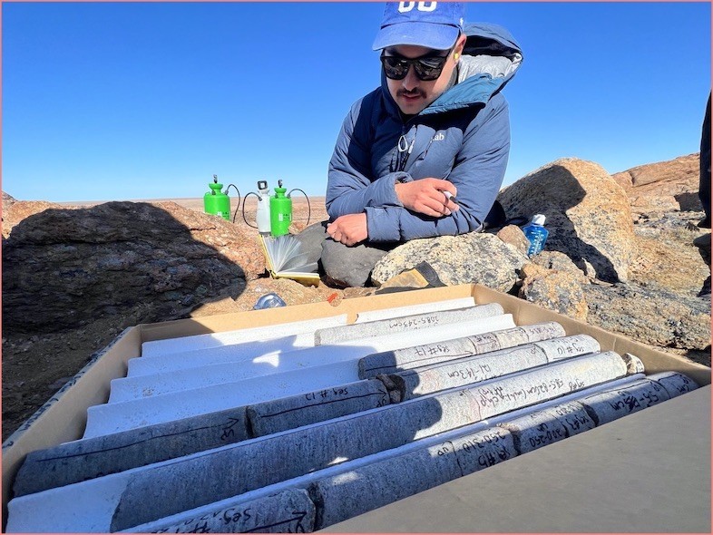 Caleb Walcott, graduate student, confirms the correct labeling of the rock core sections once collected. Caleb Walcott confirms the correct labeling of the rock core