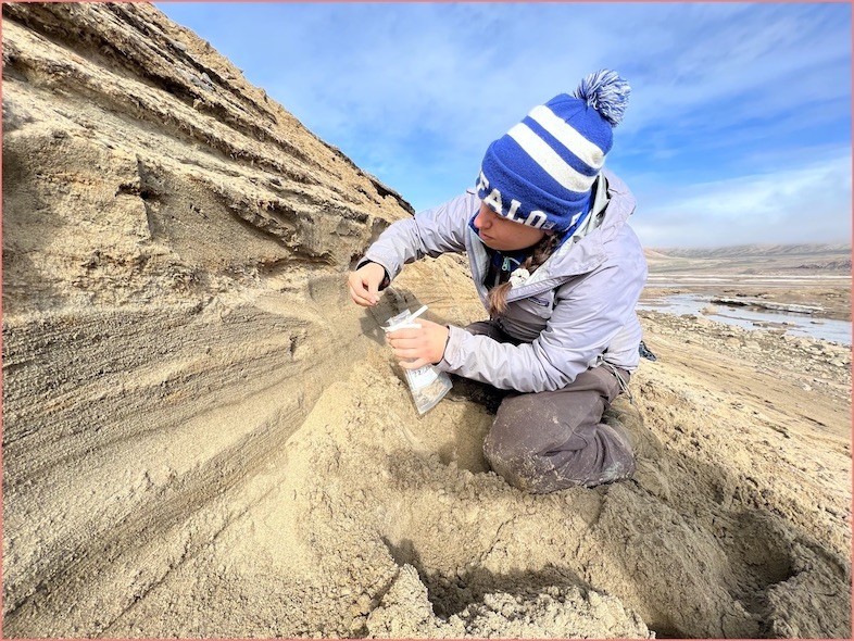 The sedmient deposits contain shells and materials that can be carbon dated to gather age dates. Karlee collects artifacts form the sediments