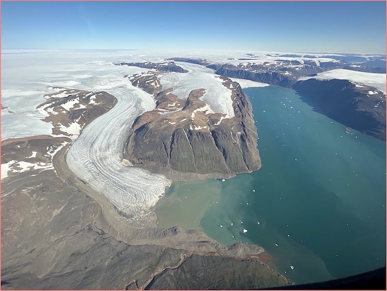 Glaciers carry large amounts of sediment from under the ice sheet to the ocean. Glacier feeding into a fjord