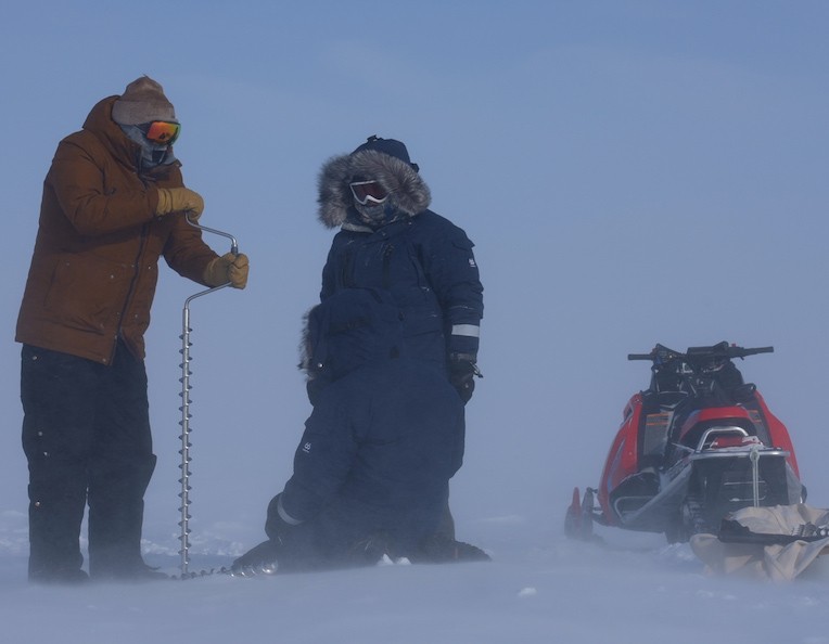 Handrills are used to help set the small explosives in the ice. Drilling into the ice