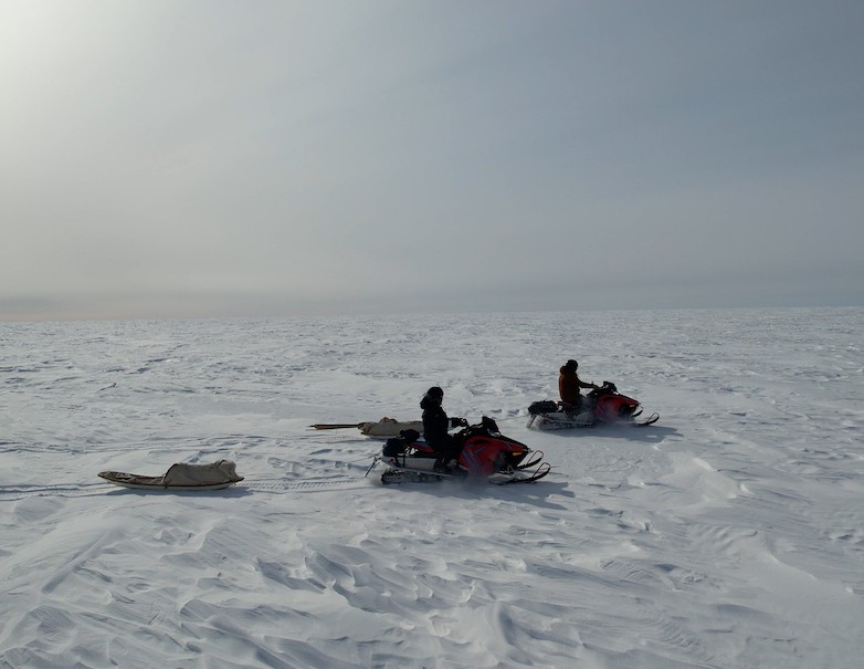 Snowmobiles are the way to move quickly across the ice surface with sledges towed behind. Snowmobiles