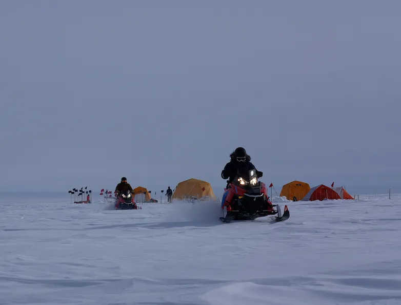 Setting off on snowmobiles